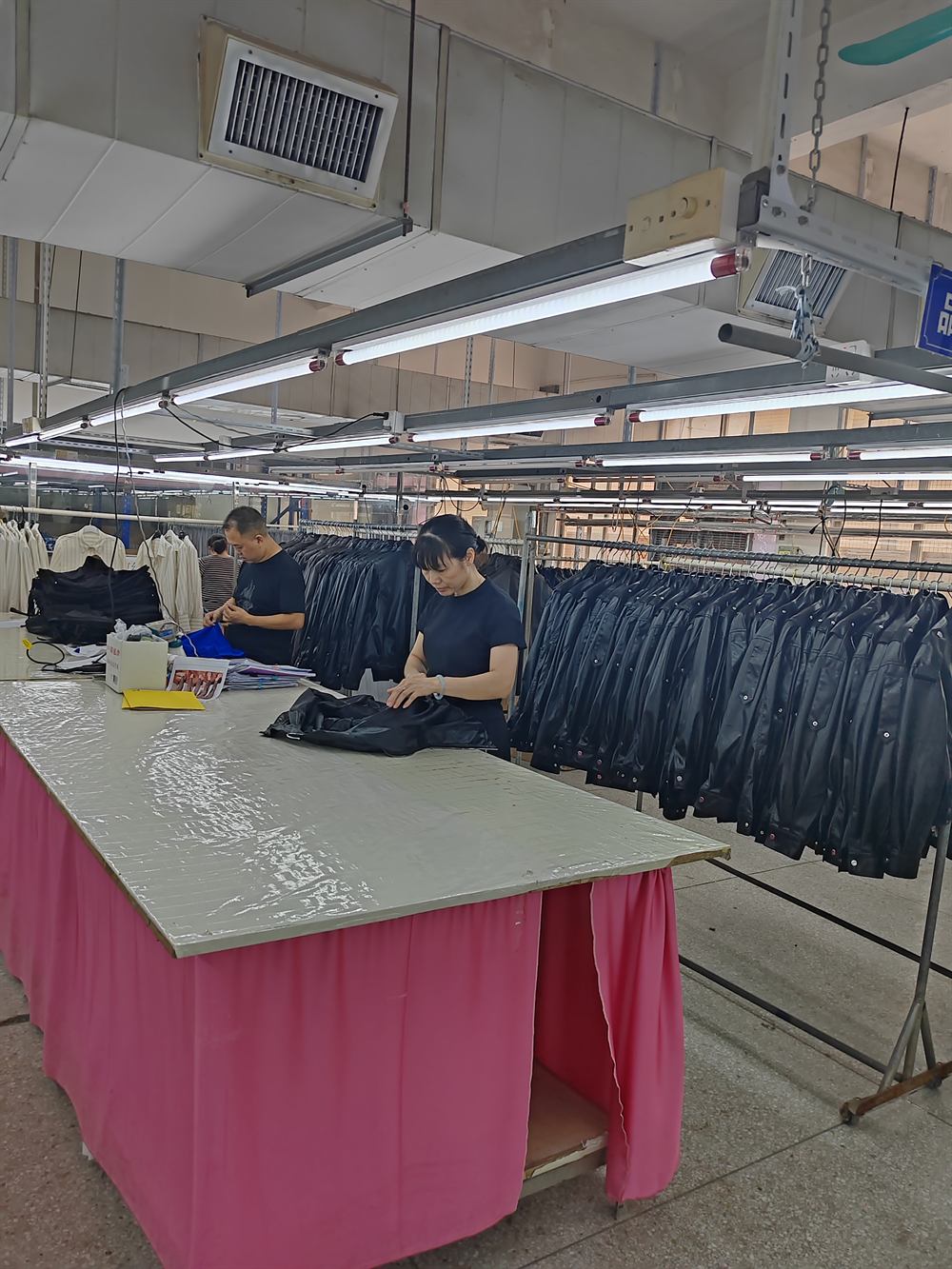 Garments on a rail during quality review